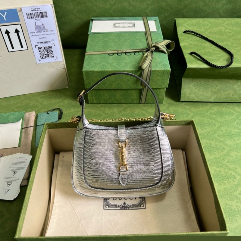 G*u*i top handle bags